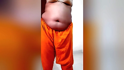 Indian slut is showing her small breasts in a solo video