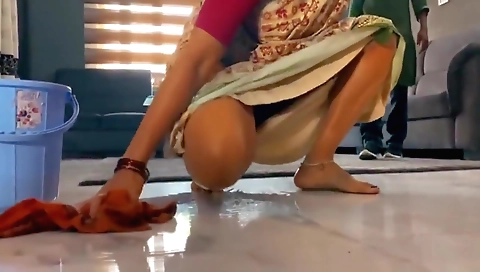 Indian brunette with large boobs in a voyeur cam vid