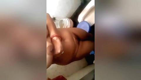 Indian hottie takes off her clothes and enjoys her hairy pussy