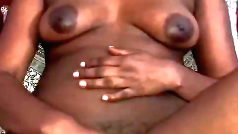 Busty brunette is fingering her hairy pussy on webcam