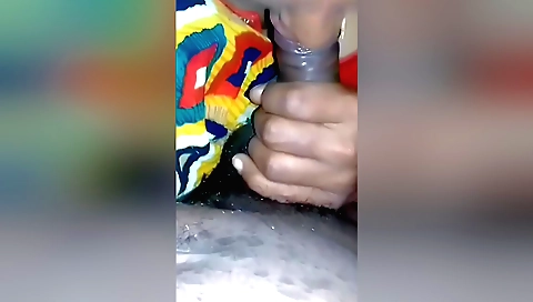 Handjob of a blonde with a nice face in a green dress