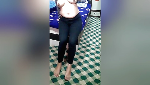 Indian girl masturbates while doing it alone on sofa