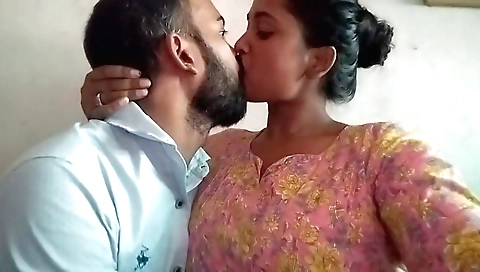 Horny amateur girl plays with her mouth on bed surface