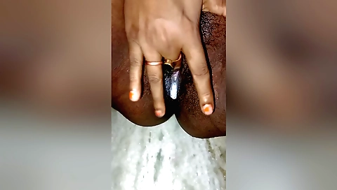 Indian beauties giving a massage in her hairy pussy