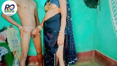 Indian brunette babe with a sexy face and a black saree