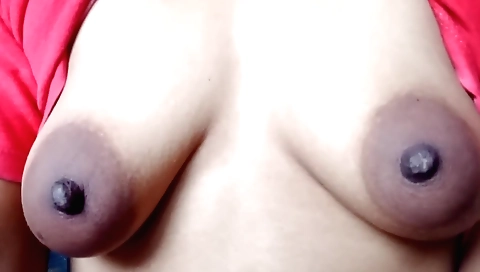 Indian brunette in a red dress gets naked on webcam video