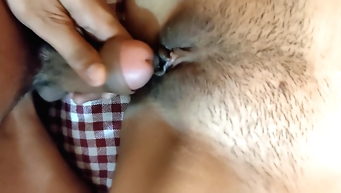 Indian girl sucks her boyfriend's cock in her hairy pussy