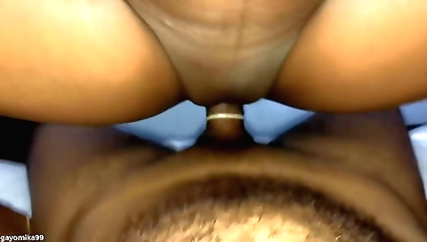 Indian brunette babe is sitting in front of the camera