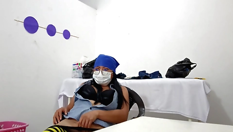 Indian nurse stretches her sweet pussy in the nude