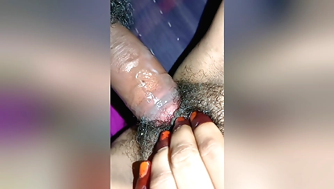 Indian chick takes out a condom while husband fucks her