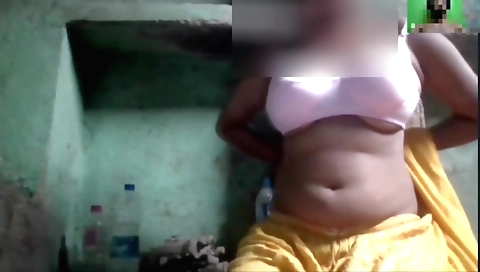 Amateur brunette with big tits masturbating on bed