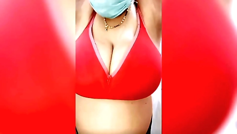 Indian girl with big boobs in a white blouse and dress