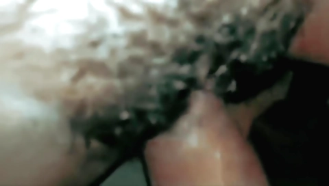 hairy babe with a hairy pussy is playing with a big dick