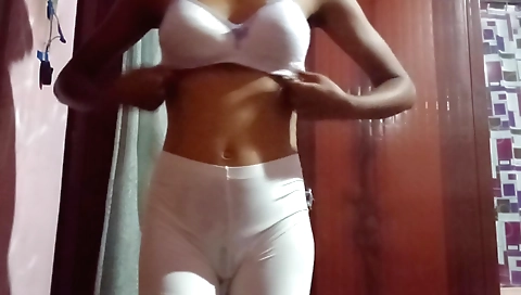 Sexy indian girl is getting her face touched and painted