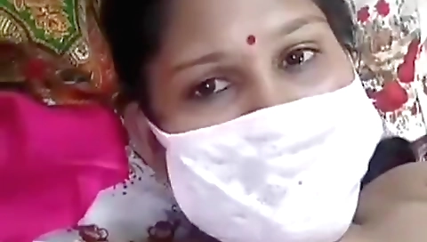 Amateur brunette shows her hairy pussy and big tits