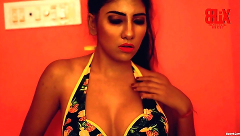 Solo brunette with a sexy figure showing off her beauty