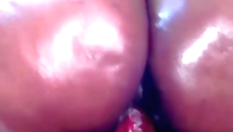 Indian chick uses dildo in her pussy while her boyfriend watches