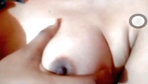 Busty brunette shows off in a tight and naked solo video