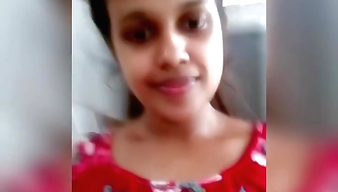 Petite indian girl in a red bikini in a webcam clip