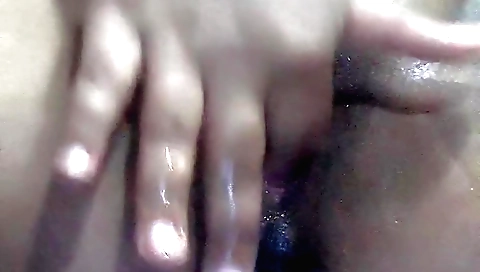 Solo girl masturbating with a camera on the bedroom