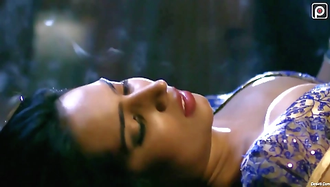 Brunette babe with a very attractive face is getting ready for a video