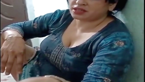 Indian milf with big tits enjoys sex on the camera