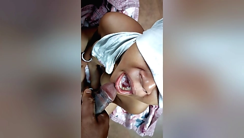 Bhabi in her indian style wears high heels and is sucking a hard cock