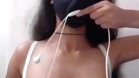 Indian brunette is showing off her big tits in solo video