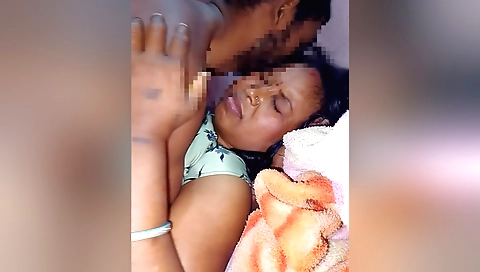 Hot girl in a sexy red dress with big boobs doing something sexy