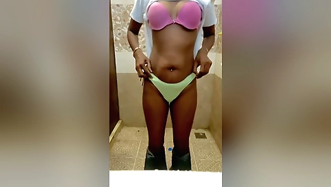 Indian girl in black dress makes homemade solo video