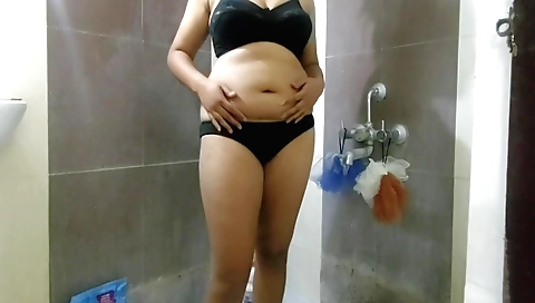 Stunning brunette with huge breasts is showing off