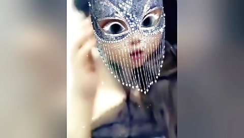 Amateur teen with sexy dress and stockings showing her boobs